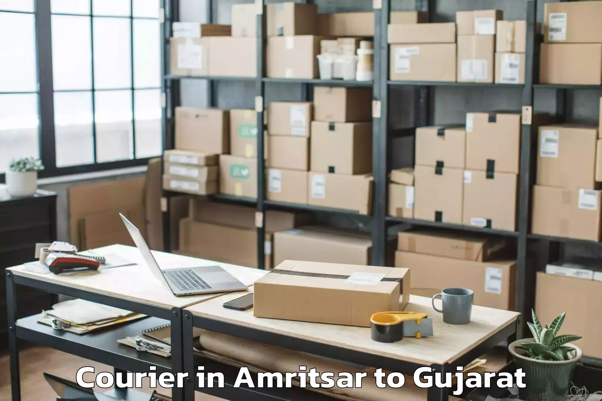 Trusted Amritsar to Khambhaliya Courier